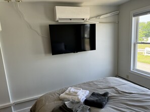 1 bedroom, desk, iron/ironing board, travel cot