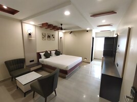 Royal Double Room | Premium bedding, laptop workspace, blackout drapes, iron/ironing board