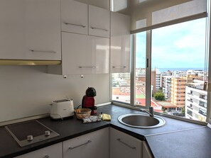 Fridge, microwave, coffee/tea maker, toaster