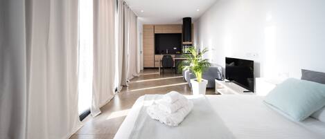 1 dormitori, planxa i posts de planxar, wifi gratuïta i roba de llit