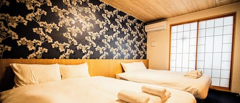 Deluxe Room | 2 bedrooms, individually decorated, individually furnished, desk