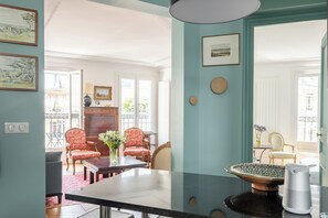 Enjoy meals for two at a beautifully set dining table amidst a serene view.