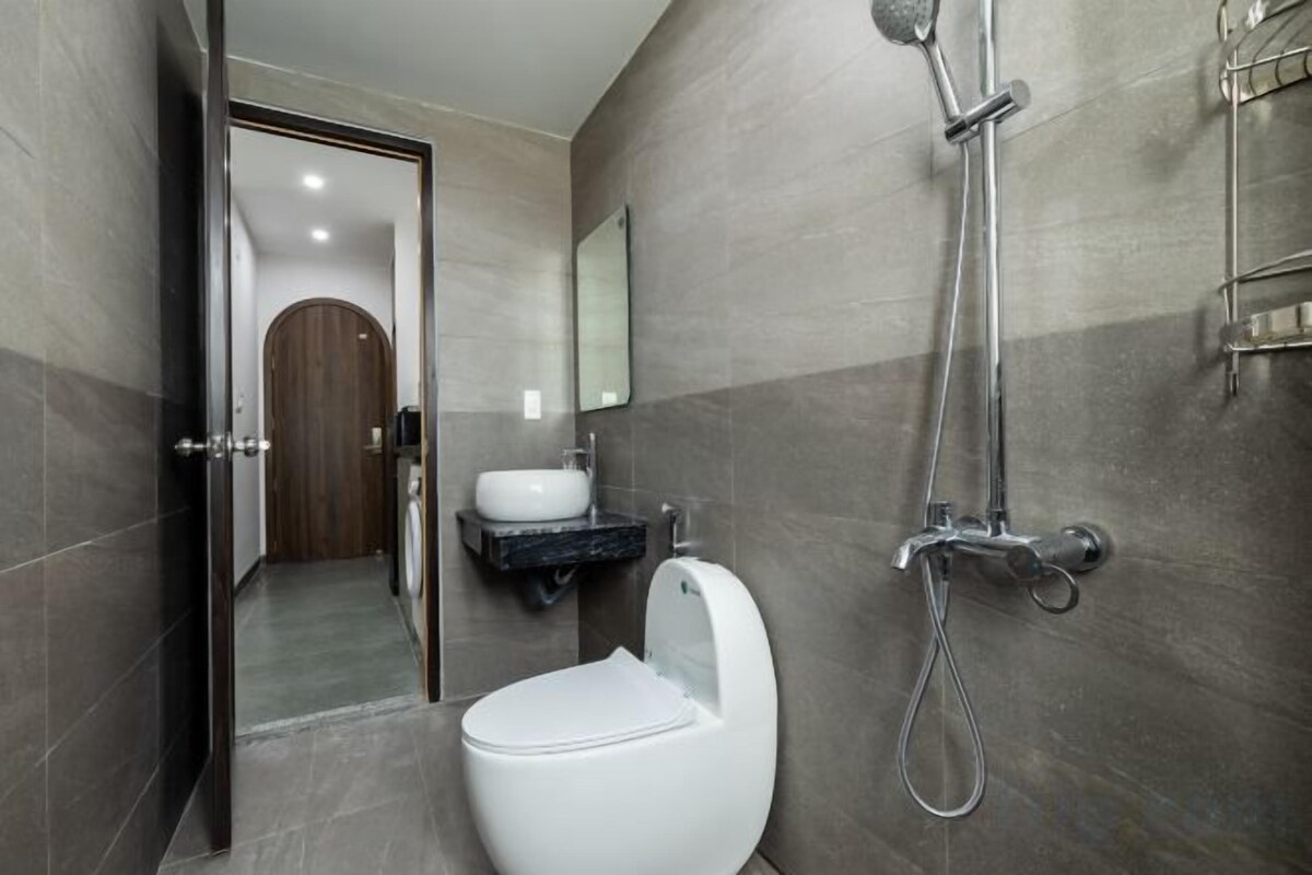 Bathroom | Shower, hydromassage showerhead, hair dryer, towels