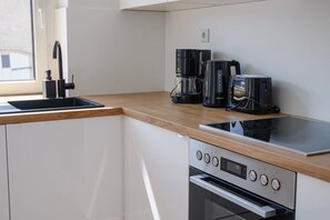 Fridge, microwave, stovetop, coffee/tea maker - Arbio Grünheide 6 people (Grünheide (Mark))