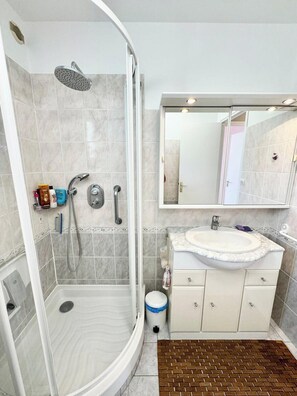 Shower, hair dryer