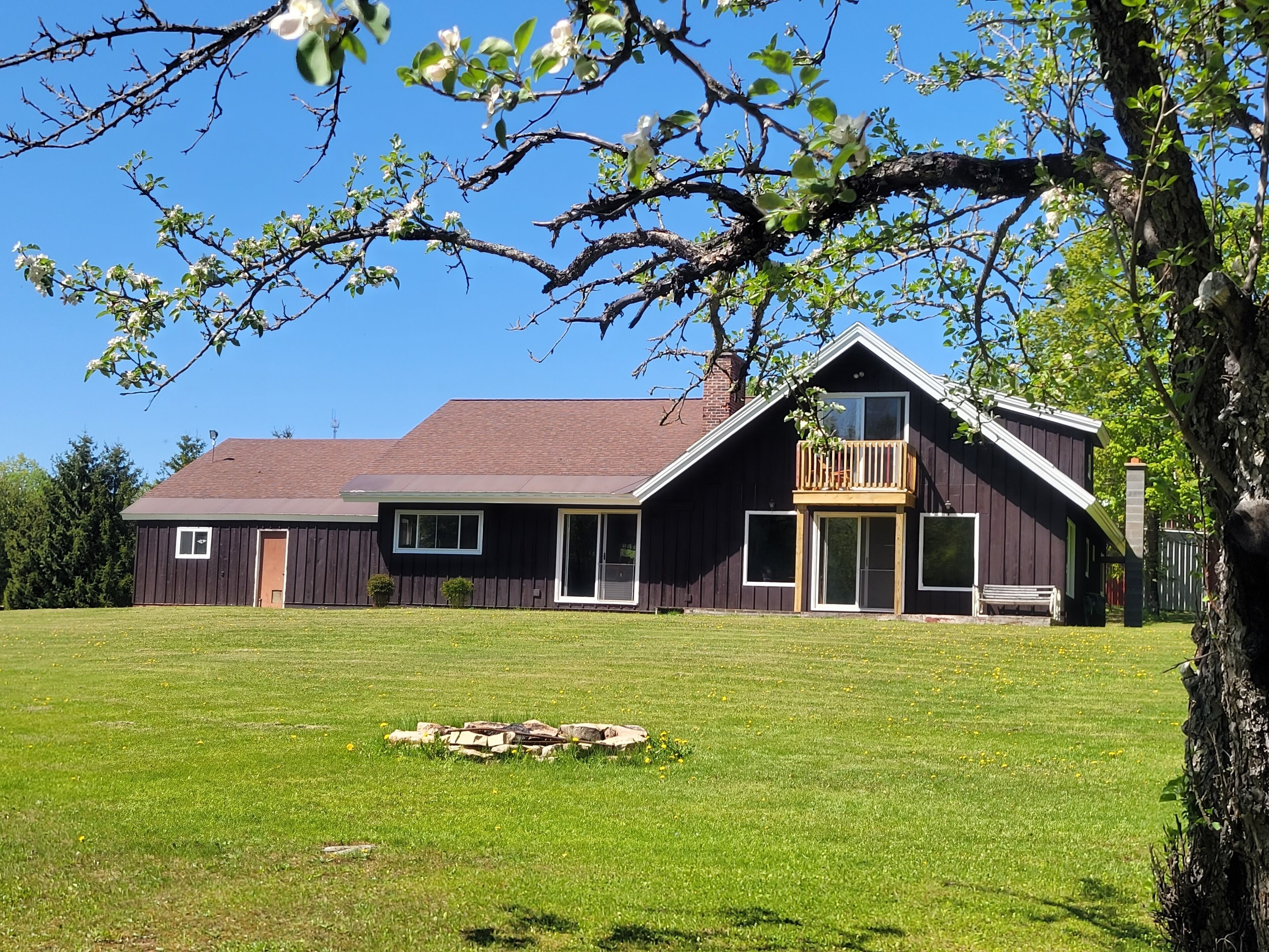 Remodeled lodge on 73 acres with 1/2 mile riverfront in Michigan's UP wilderness