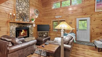Cabin, Multiple Beds, Hot Tub, Mountain View (Among The Trees) | Living area | 55-inch flat-screen TV with digital channels, fireplace