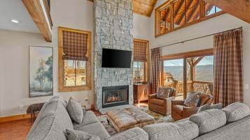 Cabin, Multiple Beds, Patio, Mountain View (Grin'Inn Bear It at Eagles Nest) | Living area | Fireplace