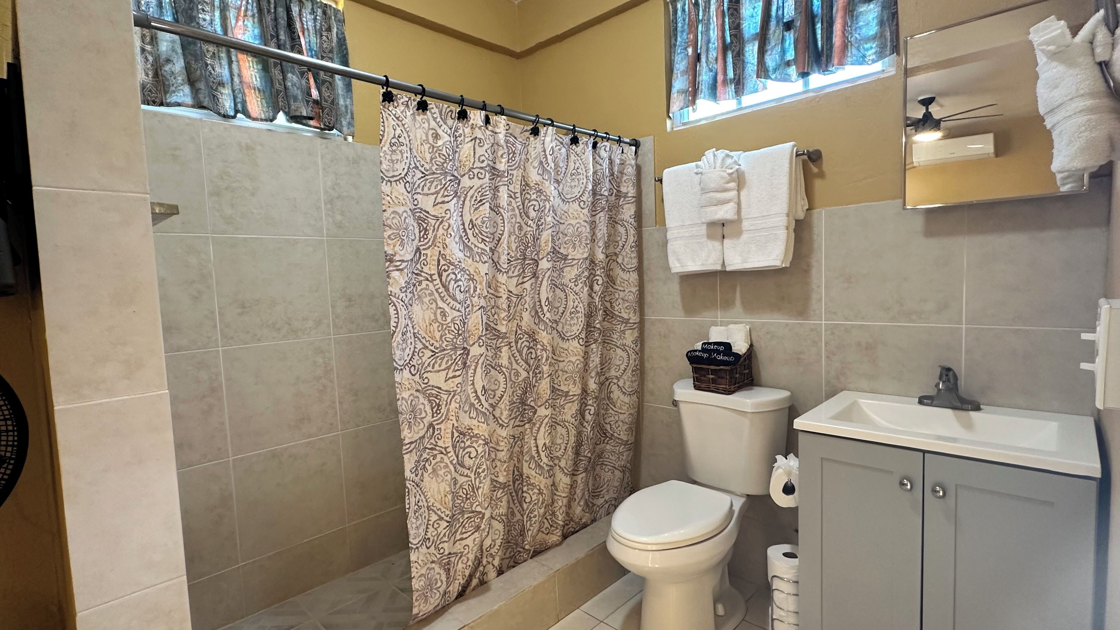 Shower, hair dryer, towels, soap