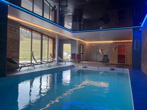 Appart-Hôtel en Montagne : Piscine, Sauna et Confort pour Toute la Famille