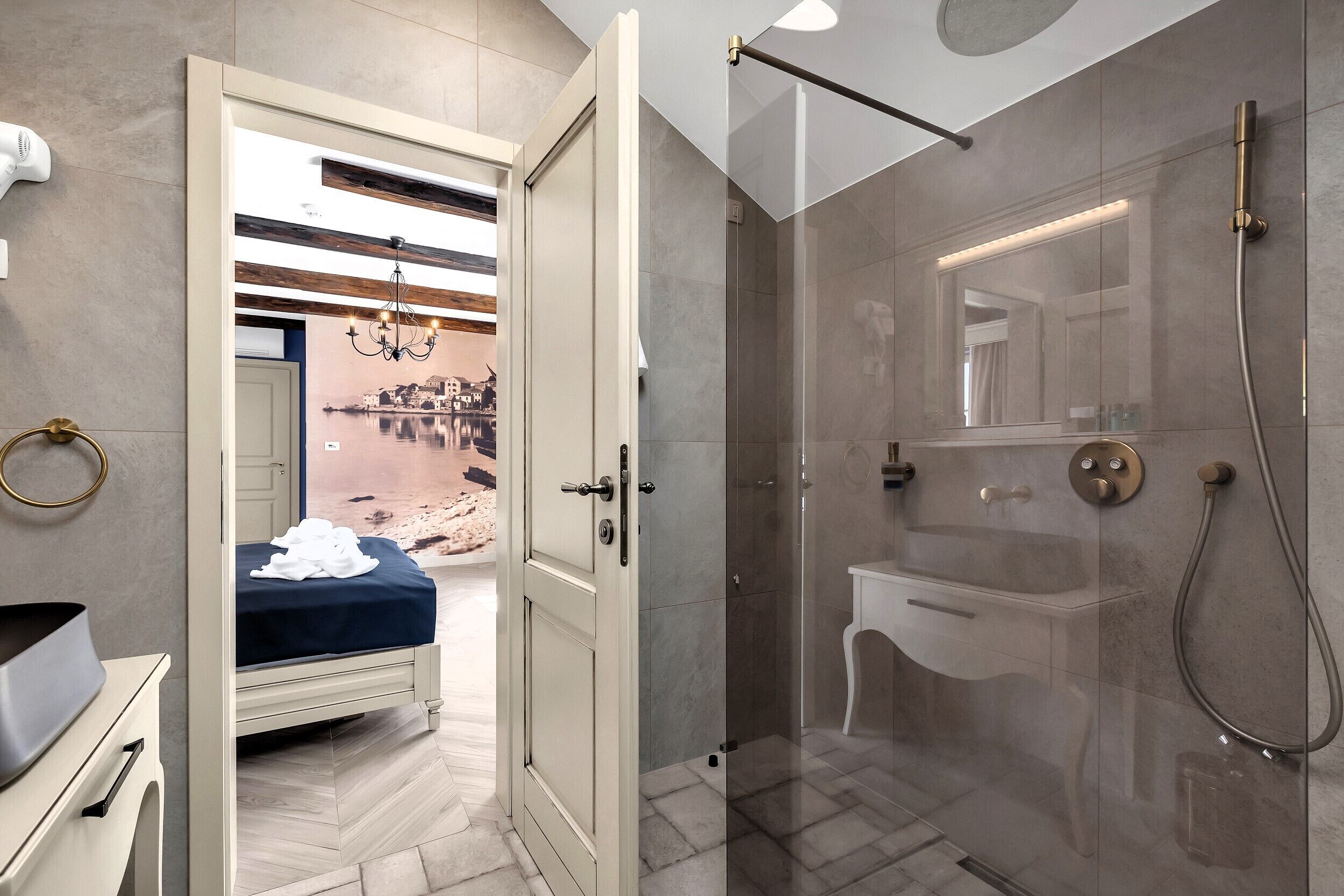 Shower, hair dryer, towels, toilet paper