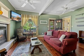 Smart TV, fireplace, books