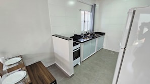 Apartment, 2 Bedrooms, Kitchen, Ground Floor | Private kitchen | Dining tables