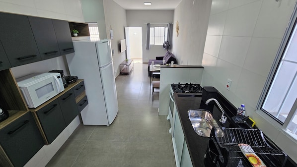 Apartment, 2 Bedrooms, Kitchen, Ground Floor | Private kitchen | Dining tables