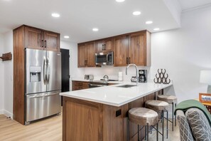 Fridge, microwave, oven, stovetop - The Charter at Beaver Creek E1305 (Beaver Creek)