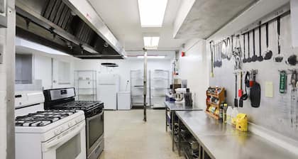Charming Prohibition-Era Speakeasy Lounge with Bedroom and Commercial Kitchen