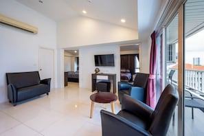 Apartamento standard, 2 quartos | Cofres nos quartos, Wi-Fi de cortesia, roupa de cama