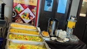 A buffet setup with various food options and a coffee station. - Ocean Palace Cox'sBazar (Cox's Bazar)