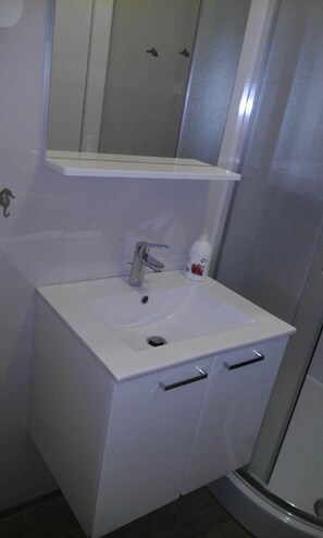 Eco-friendly toiletries, hair dryer, towels, soap