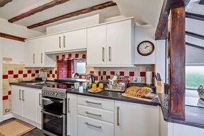 Fridge, oven, cookware/dishes/utensils