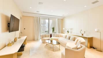 Apartamento luxo, 1 quarto | Sala de estar