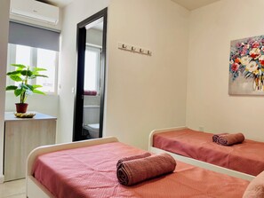2 dormitorios, tabla de planchar con plancha, wifi gratis y ropa de cama