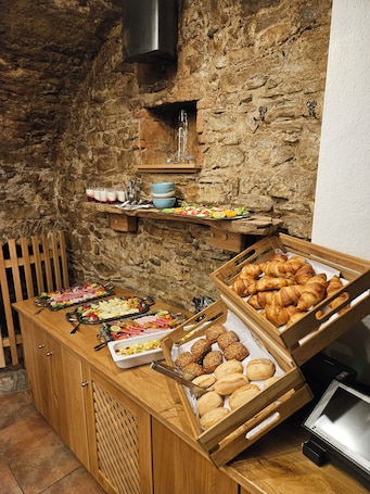 Daily buffet breakfast (EUR 12 per person)