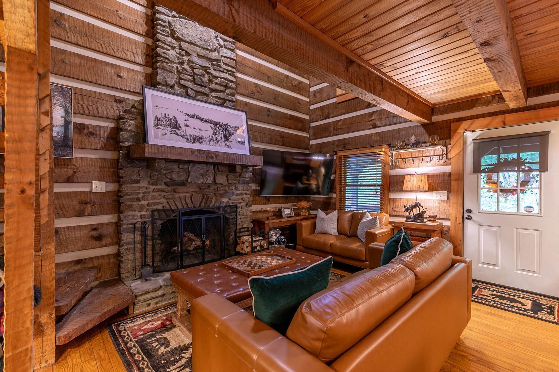 Cabin, Multiple Beds, Hot Tub, Mountain View (Whispering Pines) | Living area | Fireplace