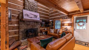 Cabin, Multiple Beds, Hot Tub, Mountain View (Whispering Pines) | Living area | Fireplace