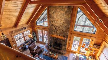 Cabin, Multiple Beds, Hot Tub, Mountain View (Highlander Hideaway) | Living area | Fireplace
