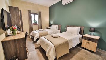 Individually furnished, desk, laptop workspace, blackout drapes