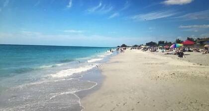 SENSATIONAL!! WATER-VIEW, LUXURY REMODEL, SUNNY HEATED POOL, HUGE 145’ SEA WALL