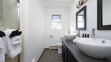Hair dryer, towels, soap, shampoo