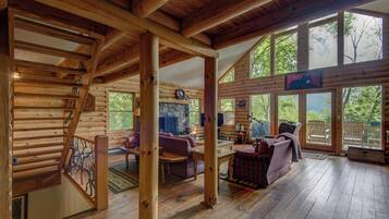 Cabin, Multiple Beds, Patio, Mountain View (Banner Bunks at River Run) | Living area | Fireplace