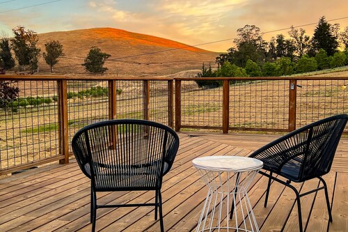 Enjoy privacy and a quiet setting with hill views and modern amenities