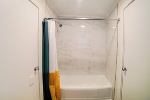 Hair dryer, towels, soap, toilet paper