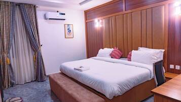 Premium bedding, down duvets, memory-foam beds, desk