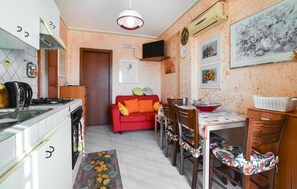 Fridge, microwave, stovetop, cookware/dishes/utensils