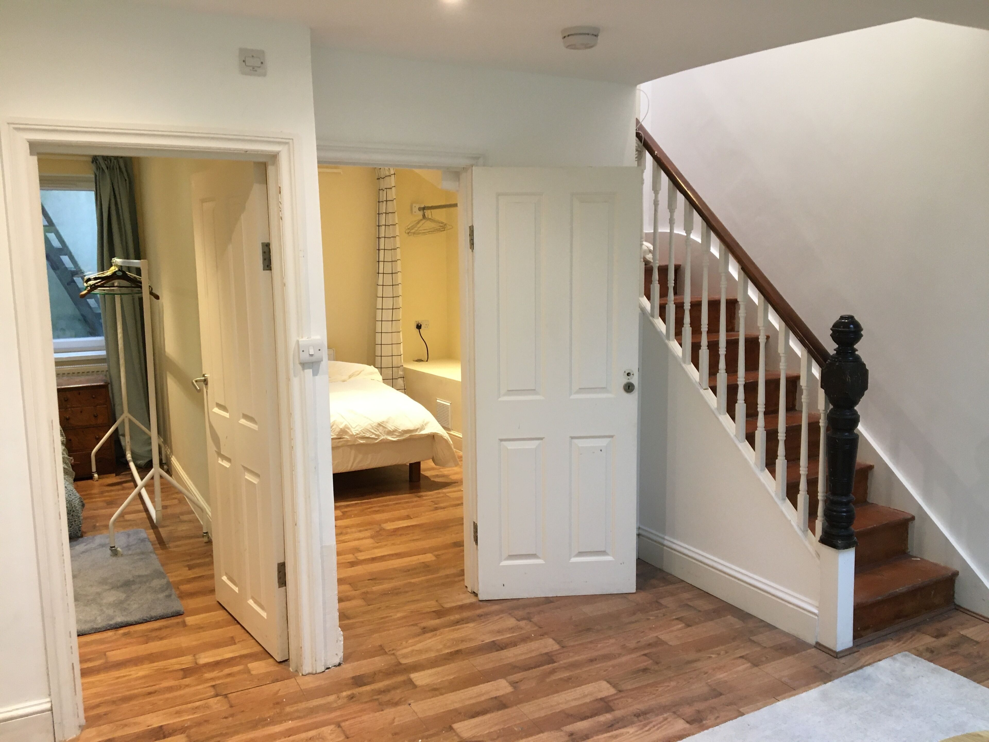 Stairs up from bedrooms to kitchen diner