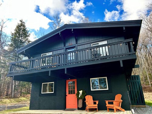 Pet-friendly winter retreat in the woods with fireplace near Okemo + Killington