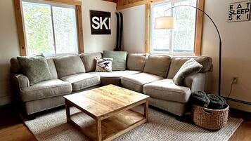 Smart TV, fireplace, DVD player, books