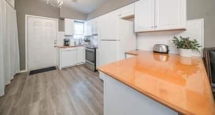 Right at Home-Uptown Place with gated yard and covered parking