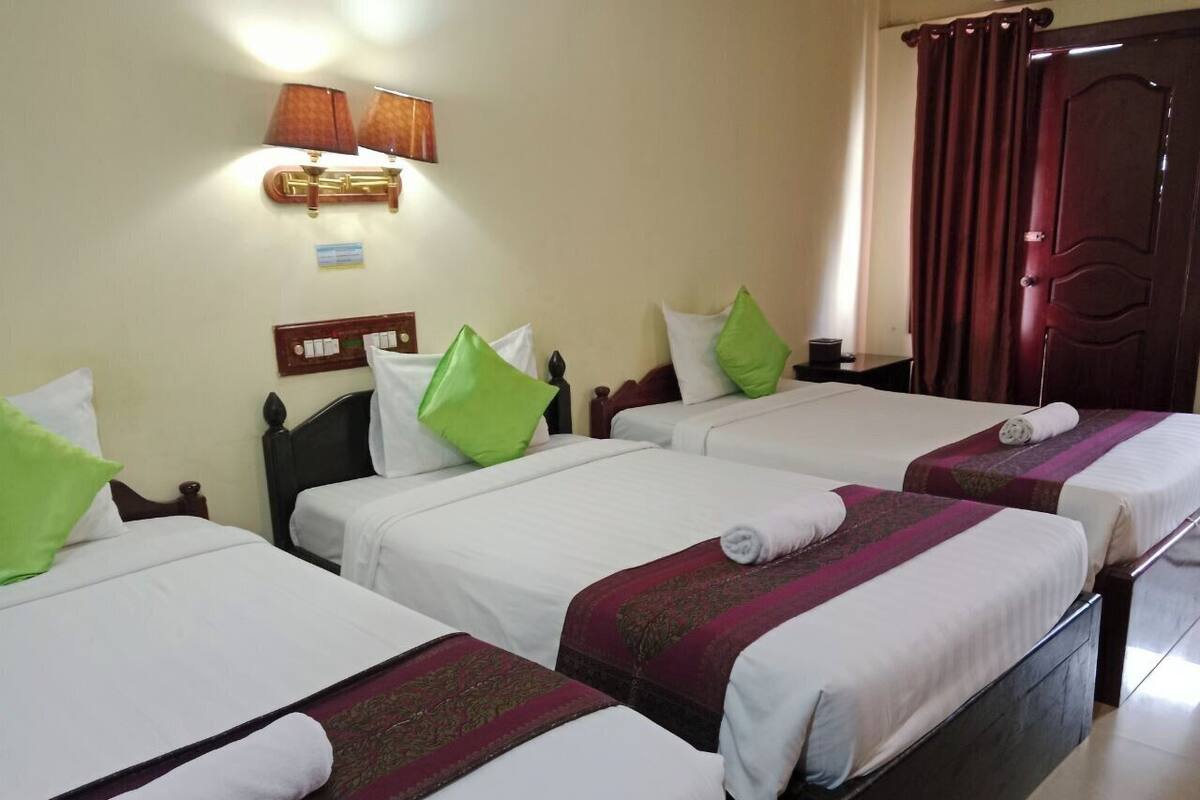 Deluxe Triple Room, City View | Desk, laptop workspace, free WiFi