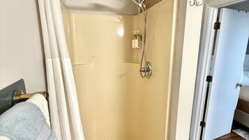 Hair dryer, towels, soap, shampoo