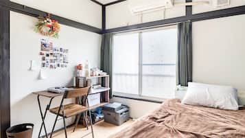 Desk, laptop workspace, free WiFi, bed sheets
