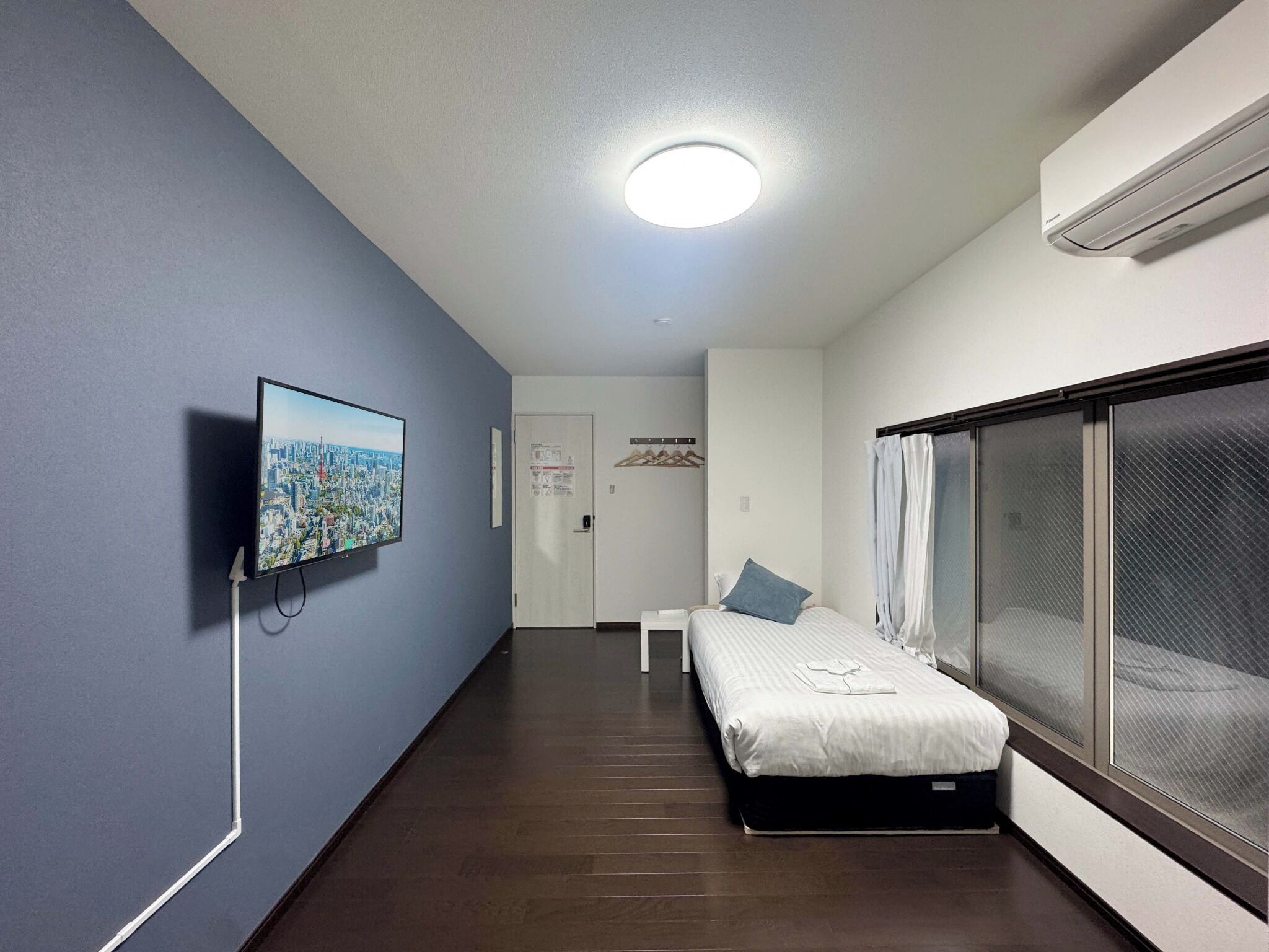 Desk, laptop workspace, blackout curtains, free WiFi