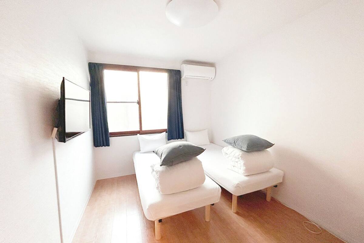 Desk, laptop workspace, blackout curtains, free WiFi