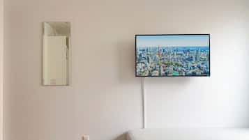 Desk, laptop workspace, free WiFi, bed sheets