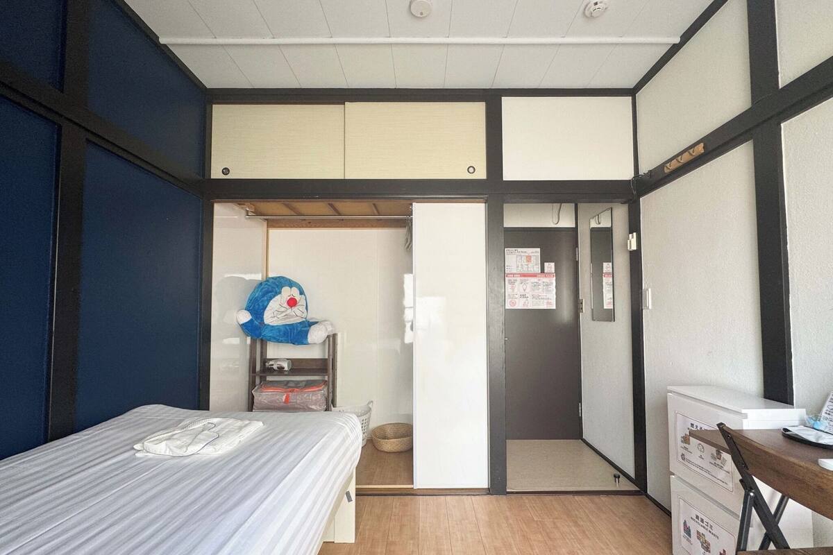 Desk, laptop workspace, blackout curtains, free WiFi