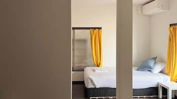 Desk, laptop workspace, free WiFi, bed sheets